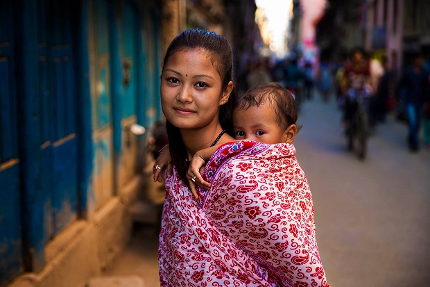 Mother and son on the streets of Kathmandu, Nepal.