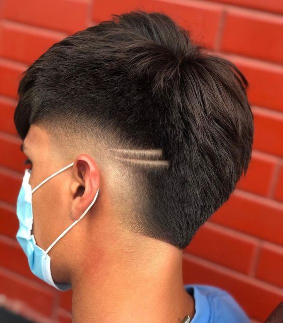Fade haircut with designs