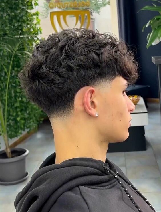 Latest perm hairstyle with low fade